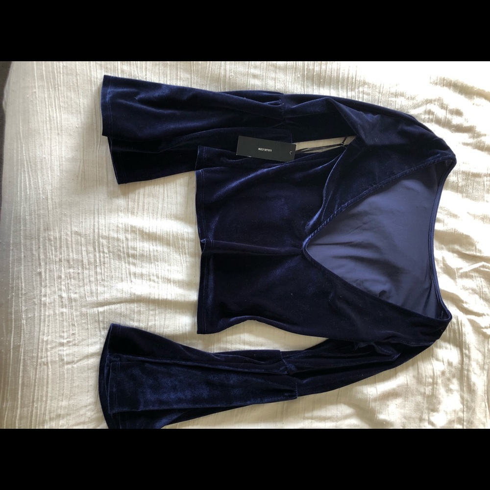 navy blue bell sleeved top